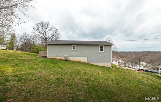 15105 Transit Rd, Saint Robert, MO 65584 - rear view of house with cooling unit and a yard