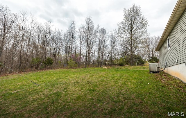 15105 Transit Rd, Saint Robert, MO 65584 - view of grassy yard featuring central air condition unit