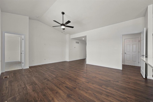 unfurnished living room with ceiling fan, lofted ceiling, dark wood-style flooring, and baseboards