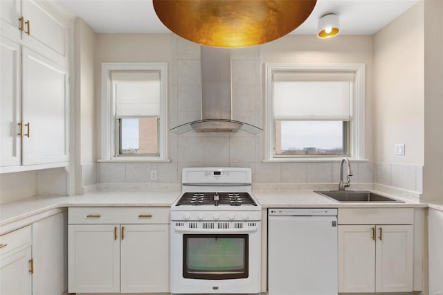 4440 Lindell Blvd Unit 701, Saint Louis, MO 63108 - kitchen featuring white appliances, a sink, white cabinetry, wall chimney range hood, and light countertops