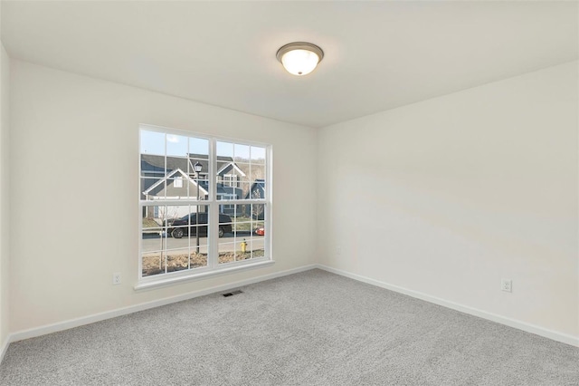 16804 River Stone Dr, Florissant, MO 63031 - carpeted spare room featuring baseboards