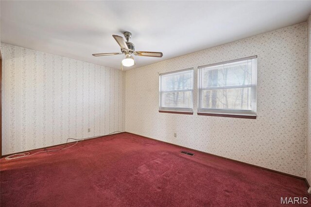 32 Oak Forest Dr, Saint Charles, MO 63303 - spare room with carpet floors and ceiling fan