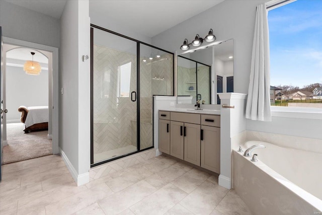 5 Canebrake Ct, Wentzville, MO 63385 - ensuite bathroom with vanity, a bath, a stall shower, and baseboards