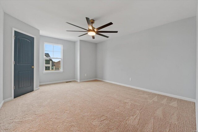 5 Canebrake Ct, Wentzville, MO 63385 - unfurnished room featuring ceiling fan, light carpet, and baseboards
