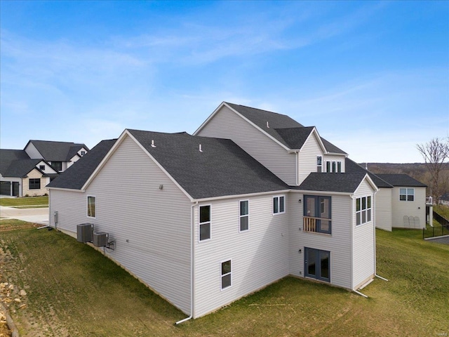 5 Canebrake Ct, Wentzville, MO 63385 - view of side of home with a yard, cooling unit, and a residential view