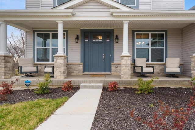 5 Canebrake Ct, Wentzville, MO 63385 - view of exterior entry with covered porch and stone siding