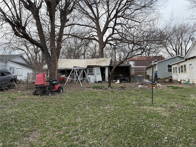 600 N 7th St, Louisiana, MO 63353 - back of house featuring a yard and entry steps