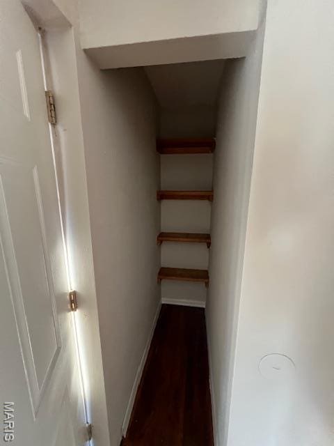 8440 N Broadway N, Saint Louis, MO 63147 - hallway with wood finished floors and baseboards