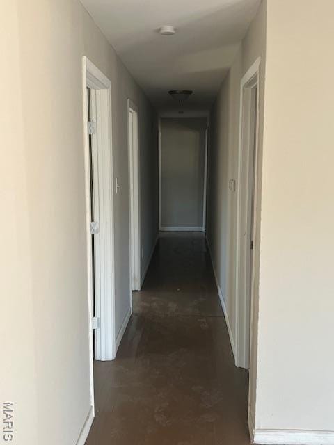 8440 N Broadway N, Saint Louis, MO 63147 - hallway featuring baseboards