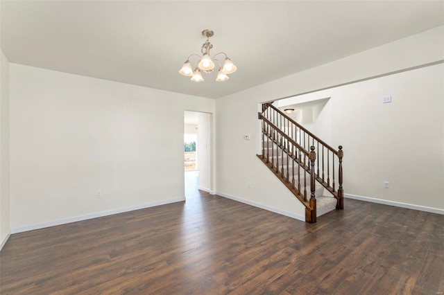 5048 Knotty Alder Dr, Imperial, MO 63052 - unfurnished living room featuring a chandelier, dark wood finished floors, stairs, and baseboards