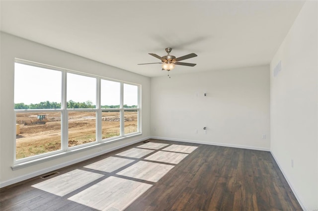 5048 Knotty Alder Dr, Imperial, MO 63052 - spare room with wood finished floors, baseboards, and ceiling fan