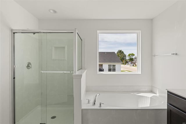 5048 Knotty Alder Dr, Imperial, MO 63052 - full bathroom featuring a stall shower, vanity, and a bath