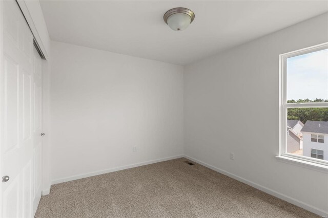 5048 Knotty Alder Dr, Imperial, MO 63052 - unfurnished room featuring light colored carpet and baseboards