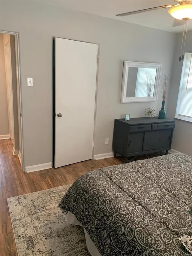 6703 Etzel Ave, Saint Louis, MO 63130 - bedroom featuring wood finished floors, baseboards, and ceiling fan