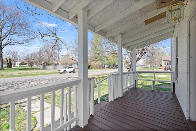 407 N Humboldt St, Marine, IL 62061 - deck featuring covered porch and a lawn