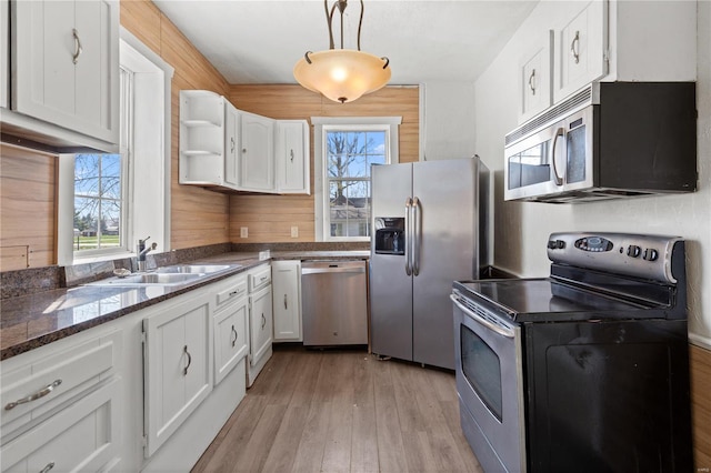 407 N Humboldt St, Marine, IL 62061 - kitchen featuring stainless steel appliances, a sink, healthy amount of natural light, and white cabinets