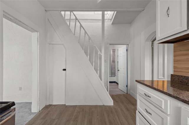 407 N Humboldt St, Marine, IL 62061 - stairs featuring wood finished floors and a skylight