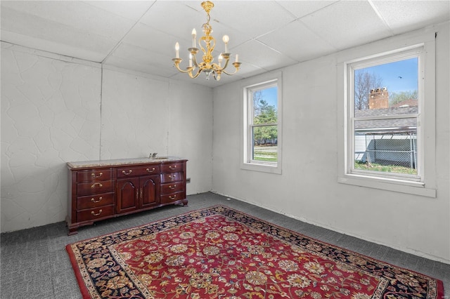 407 N Humboldt St, Marine, IL 62061 - unfurnished room featuring a chandelier, a drop ceiling, and dark carpet