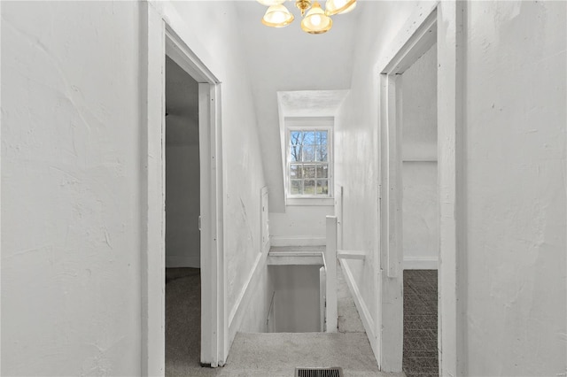 407 N Humboldt St, Marine, IL 62061 - hallway with carpet floors, a chandelier, and baseboards