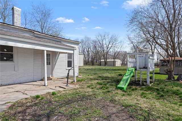 407 N Humboldt St, Marine, IL 62061 - view of green lawn featuring a playground
