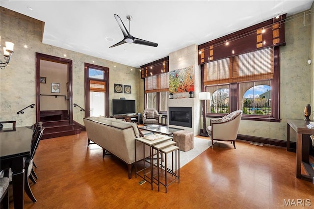3520 Galt House Dr, Saint Charles, MO 63301 - living room with plenty of natural light, a ceiling fan, and a fireplace