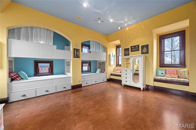 3520 Galt House Dr, Saint Charles, MO 63301 - unfurnished living room featuring tile patterned floors, built in features, baseboards, and track lighting