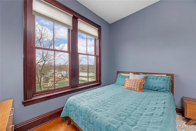 3520 Galt House Dr, Saint Charles, MO 63301 - bedroom with baseboards and wood finished floors