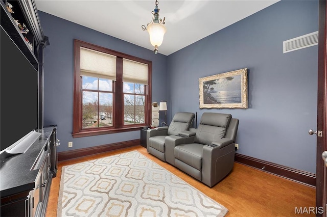 3520 Galt House Dr, Saint Charles, MO 63301 - living area featuring light wood-type flooring and baseboards