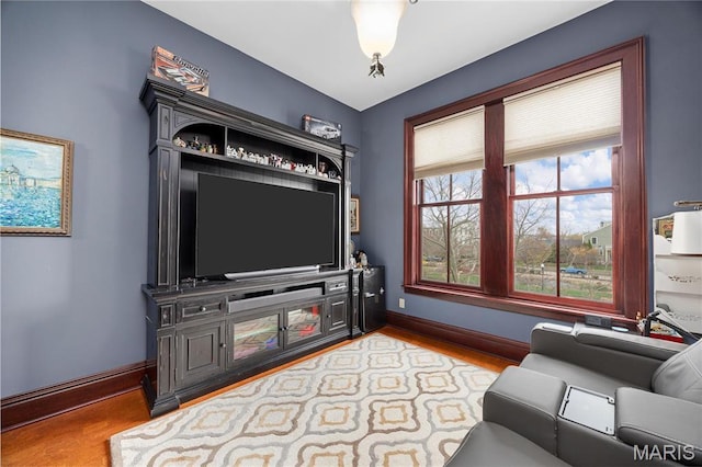 3520 Galt House Dr, Saint Charles, MO 63301 - living room featuring wood finished floors and baseboards