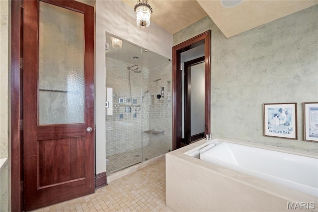 3520 Galt House Dr, Saint Charles, MO 63301 - full bathroom featuring a stall shower, a bath, and tile patterned flooring