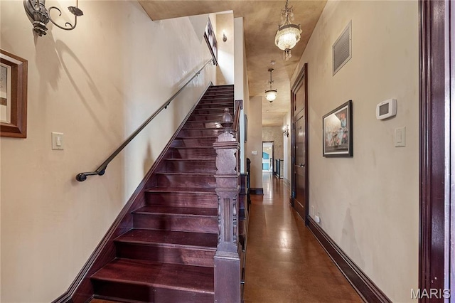 3520 Galt House Dr, Saint Charles, MO 63301 - stairway featuring concrete floors and baseboards