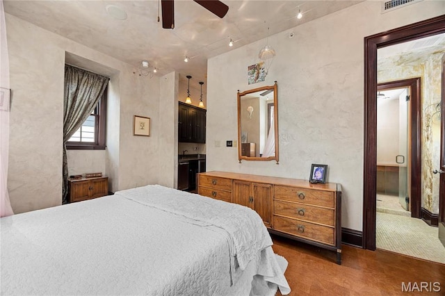 3520 Galt House Dr, Saint Charles, MO 63301 - bedroom with track lighting and ensuite bath