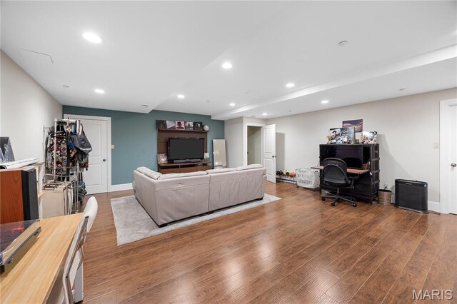3520 Galt House Dr, Saint Charles, MO 63301 - living area with wood finished floors, recessed lighting, an office area, and baseboards
