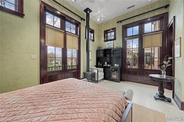 3520 Galt House Dr, Saint Charles, MO 63301 - bedroom featuring french doors, carpet, access to outside, and a textured wall