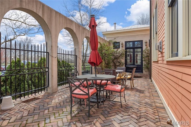 3520 Galt House Dr, Saint Charles, MO 63301 - view of patio featuring french doors and outdoor dining area