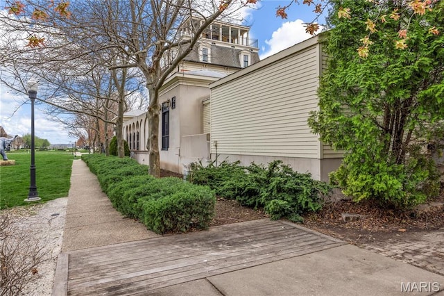 3520 Galt House Dr, Saint Charles, MO 63301 - view of side of home featuring a lawn