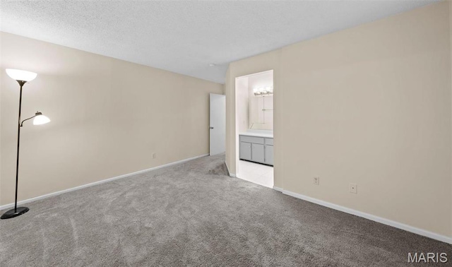 4319 Lindell Blvd Unit A, Saint Louis, MO 63108 - spare room with carpet flooring and baseboards