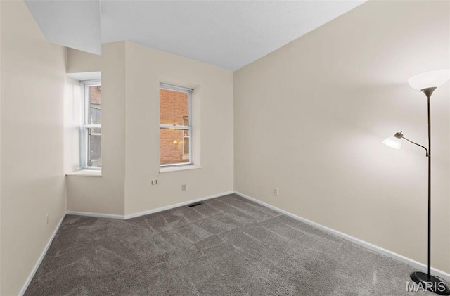 4319 Lindell Blvd Unit A, Saint Louis, MO 63108 - spare room with carpet and baseboards