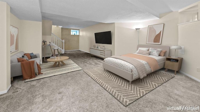 4319 Lindell Blvd Unit A, Saint Louis, MO 63108 - bedroom with carpet flooring and a textured ceiling