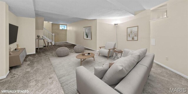4319 Lindell Blvd Unit A, Saint Louis, MO 63108 - living area with stairs, carpet floors, and a textured ceiling