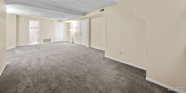 4319 Lindell Blvd Unit A, Saint Louis, MO 63108 - carpeted empty room with a textured ceiling and baseboards