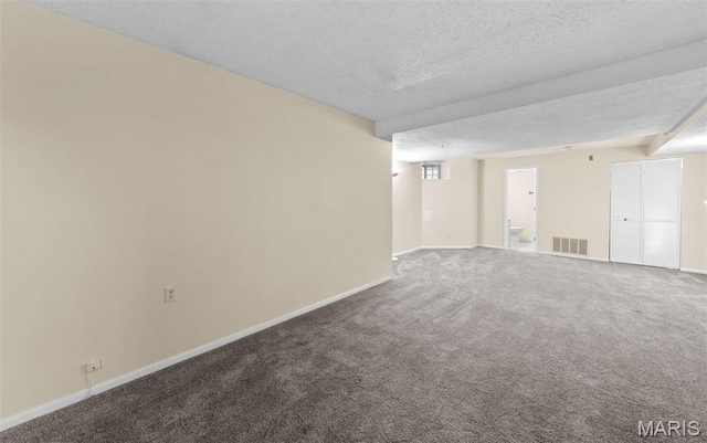 4319 Lindell Blvd Unit A, Saint Louis, MO 63108 - carpeted empty room featuring baseboards and a textured ceiling