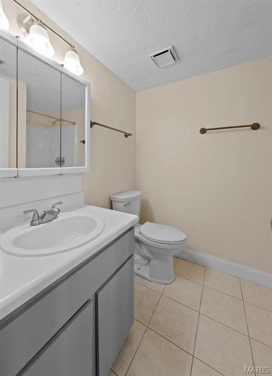 4319 Lindell Blvd Unit A, Saint Louis, MO 63108 - full bath featuring vanity, tile patterned floors, and a textured ceiling