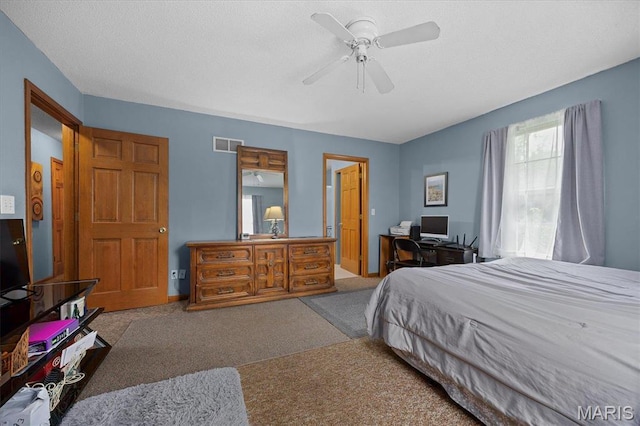 830 Wayne St, Carlyle, IL 62231 - bedroom featuring carpet, a ceiling fan, and baseboards