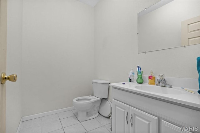 830 Wayne St, Carlyle, IL 62231 - half bathroom with tile patterned flooring, vanity, toilet, and baseboards