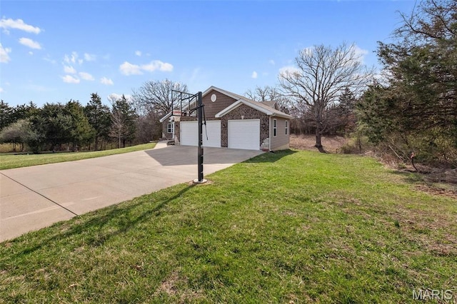 140 Shumard Oak Dr, Troy, MO 63379 - view of property exterior with an attached garage, concrete driveway, and a lawn