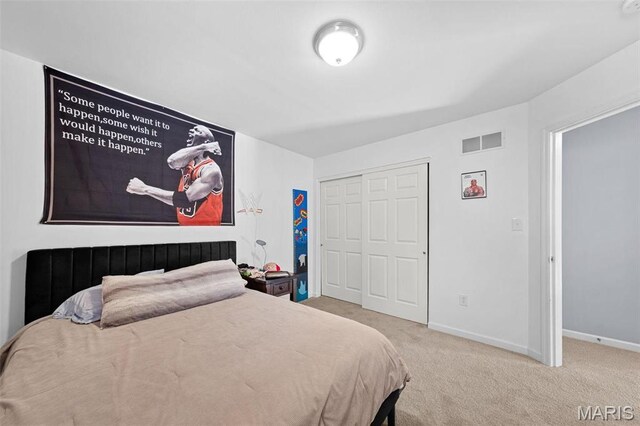 140 Shumard Oak Dr, Troy, MO 63379 - bedroom with carpet floors, a closet, and baseboards