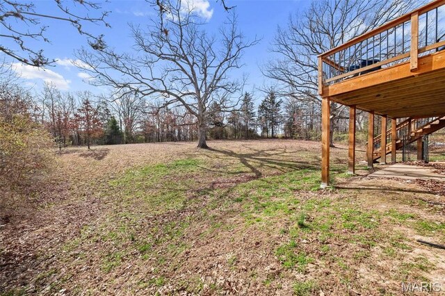 140 Shumard Oak Dr, Troy, MO 63379 - view of yard featuring stairway and a deck
