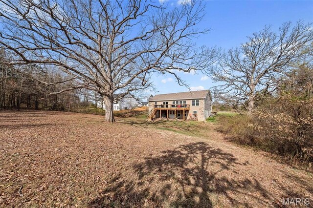 140 Shumard Oak Dr, Troy, MO 63379 - view of yard with a deck and stairway