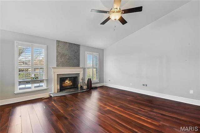 910 Ridgepointe Place Cir, Lake St Louis, MO 63367 - unfurnished living room with healthy amount of natural light, vaulted ceiling, wood-type flooring, baseboards, and ceiling fan